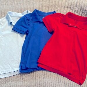Children’s Place Boys Polos. Set of 3. Colors light blue, red and blue. XS (4)